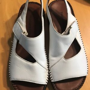 Naturalized white sandals